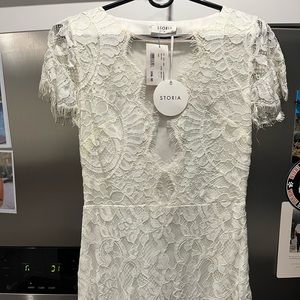 Womens white lace overlay dress. New with tags. Size medium